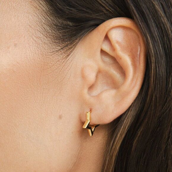 Gold Star Huggie Earrings - Picture 3 of 6